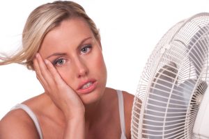 woman-in-front-of-fan