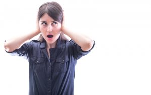 woman-surprised-by-loud-noise